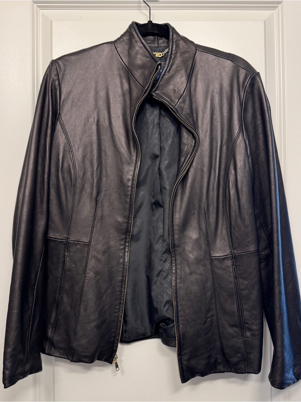 Cole Haan black leather jacket with zipper, size L but fits like M